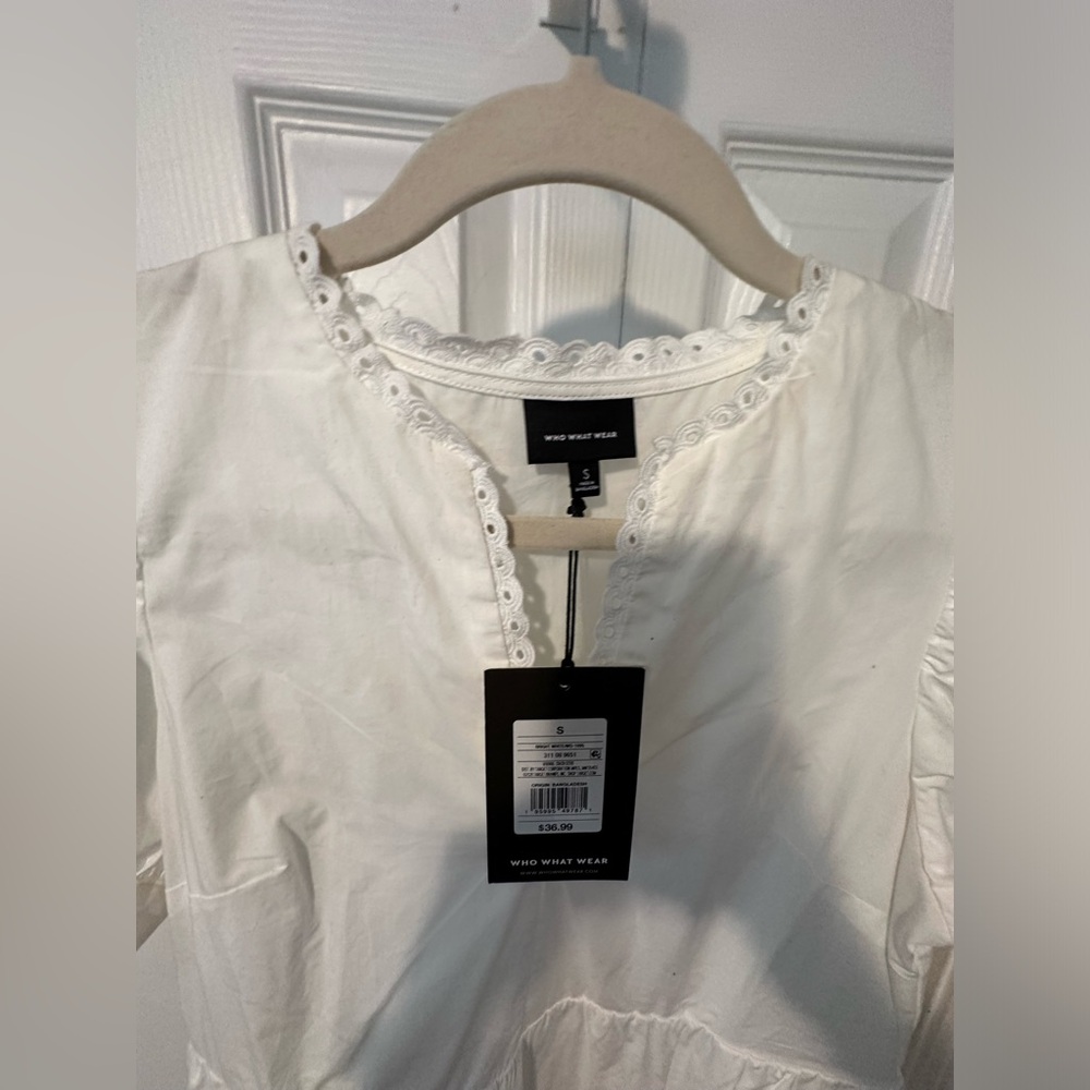 Tiered midi dress perfect coverup for linner!Love the eyelet detail around neck!